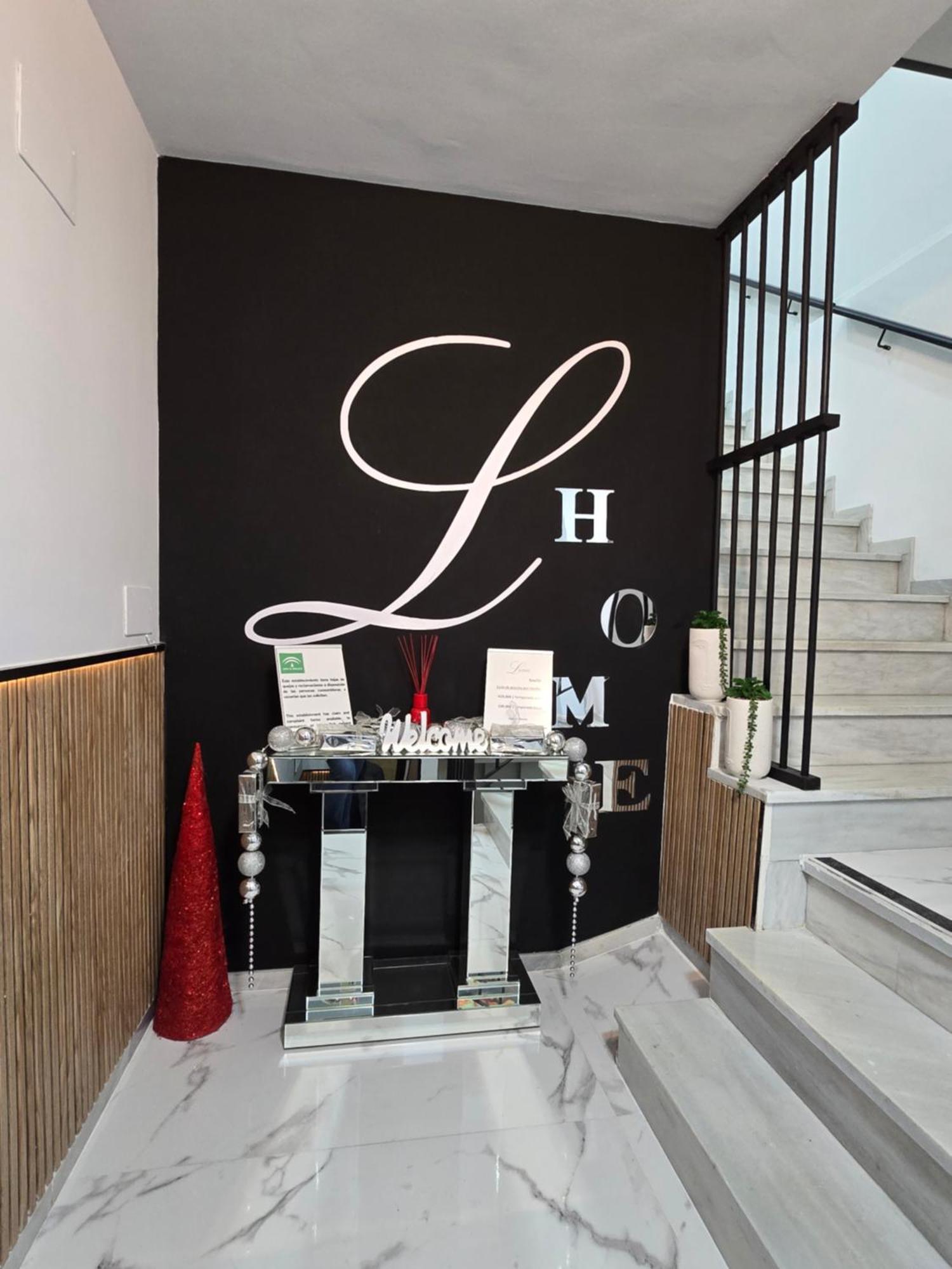 Lhome * Sevilla